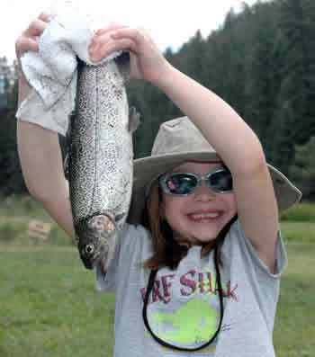 Little girl and big trout - NDMGF Archive News: Celebrate Free Fishing Day at statewide fishing clinics