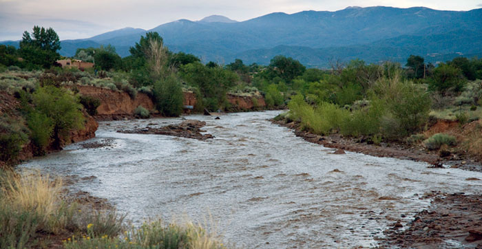 Flash flooding in the Rio Santa Fe. Photo by Marti Niman. Conservation Education Lessons - Water on the Move - New Mexico Department of Game and Fish (photo Rio Santa Fe flash food by Marti Niman)