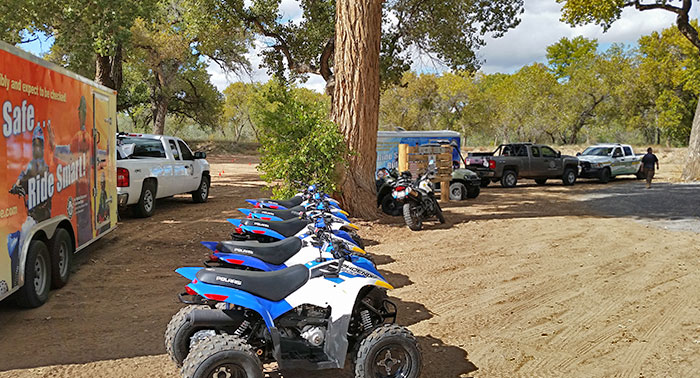 Instructor and youth at OHV off-highway vehicle free safety education class from New Mexico Department of Game and Fish 