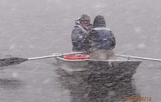 New Mexico Game and Fish conducting a population survey with the Carson National Forest during a snow storm.