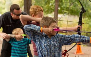 Archery can be fun and safe for all ages of youth and adults. Public Information Specialist Jeremy Lane coaches this group of youth as they shoot archery for the first time.