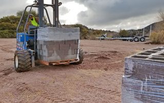 Cinderblocks being delivered.